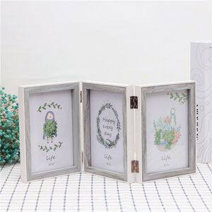 Factory wholesale two folding double-sided photo frame retro combination table 6 inch 7 inch conjoined photo studio photo frame frame ornaments