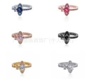 Open saturn ring with diamond accents (white gold tone)