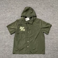 Green shirt (hat is removable)