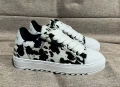 Number - white and black leopard print