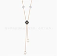 Four-leaf clover tassel necklace