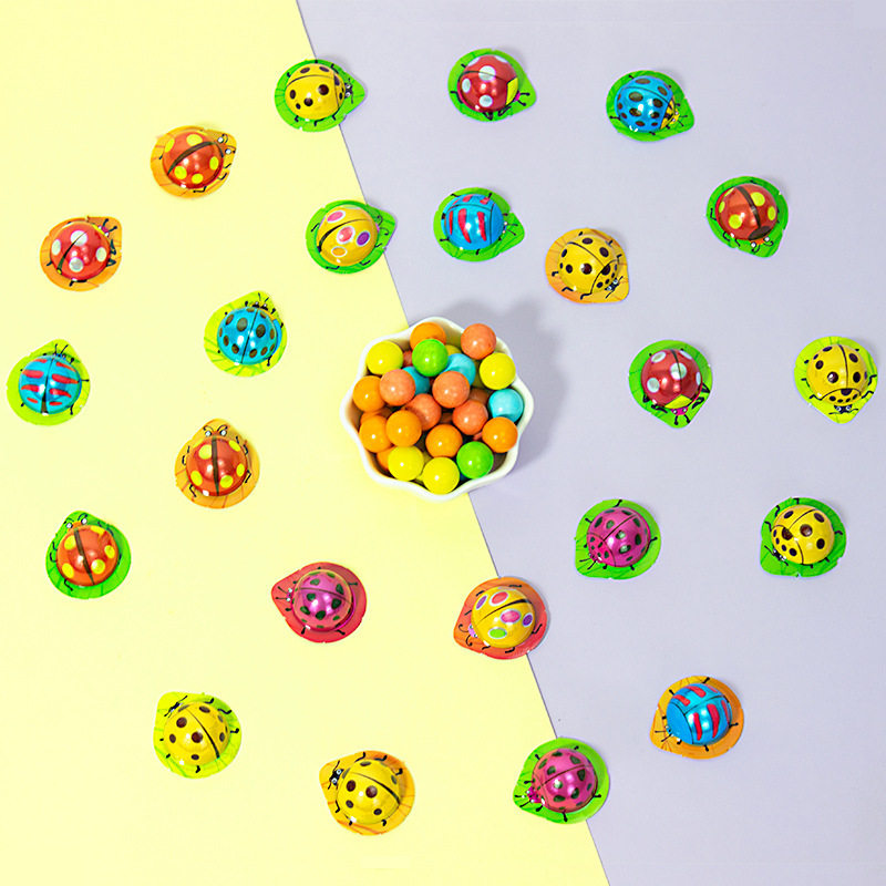 Cartoon Seven Star Ladybug Cute Leaf Crispy Milk Fragrance Sandwich Milk Chocolate Beans Children's Snacks Candy Wholesale
