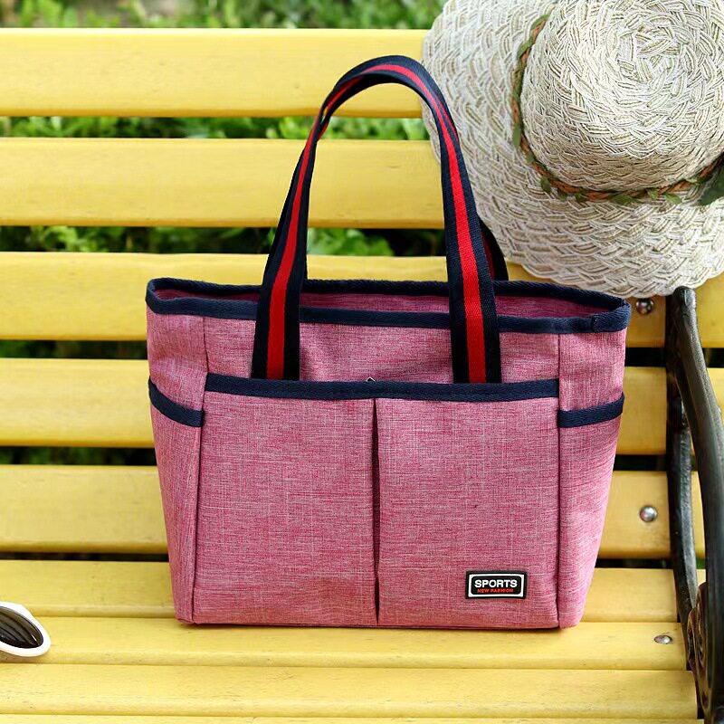 New canvas women's handbag casual bag mummy lunch bag solid color retro hand bag white ditch factory wholesale