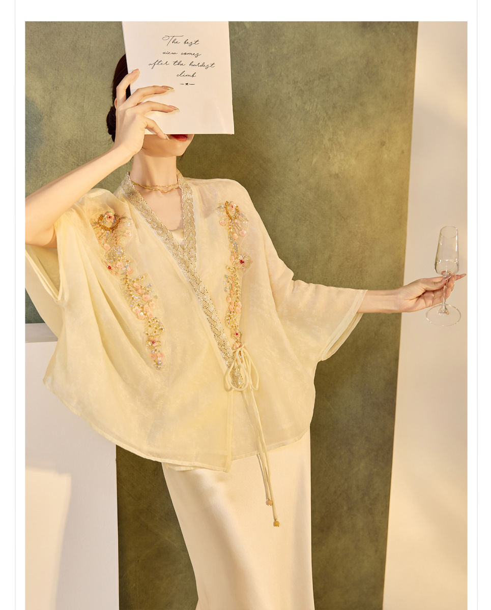 Áo khoác cardigan nữ dáng rộng thêu đính cườm chất liệu tencel phong cách nhẹ nhàng — mơ