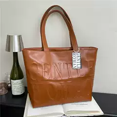 High-End Pu Shoulder Bag for Women, Large Capacity Gw Letter Embossed Tote Bag, New Cross-Border Artistic Handbag for Commuting