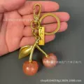 Light orange cherry pendant