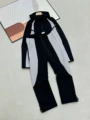 Black and light gray suit
