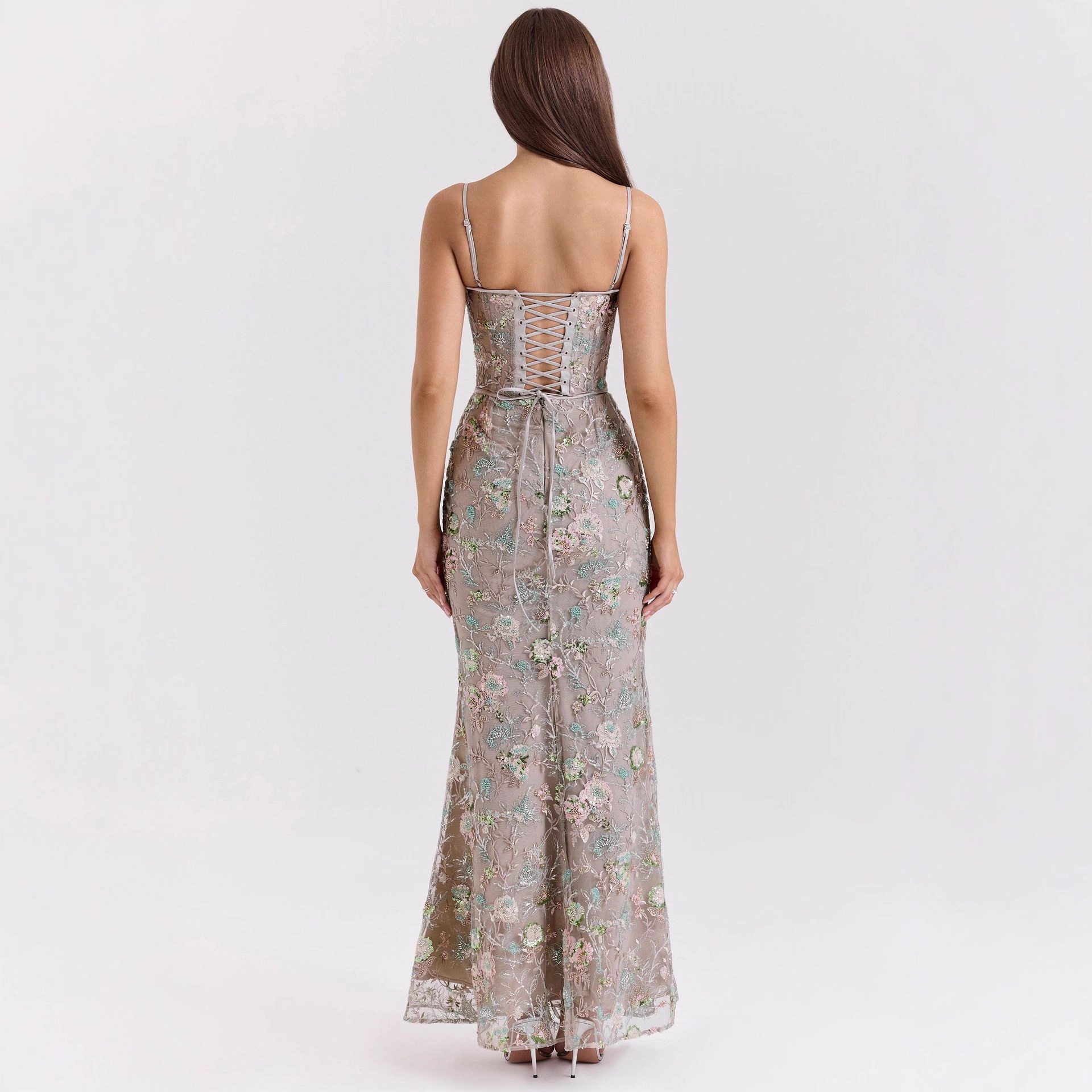 Elegant Sleeveless Backless Dress Low Neckline Tie Detail Chic Design Perfect for Parties and Special Occasions