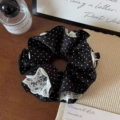 1 black polka dot