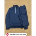 Navy blue half-zip jacket + straight-leg pants