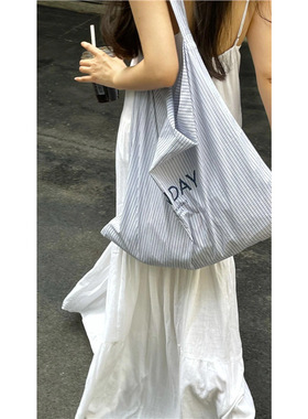 韩国春夏新款包包大容量设计师简约印花条纹帆布包女ins百搭肩包