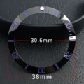 Ceramic black circle purple characters blue and green light