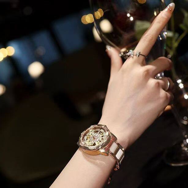 A generation of shaking audio and video number explosions sunflower hollow ladies watch ceramic white flywheel diamond watch women 8 undefined
