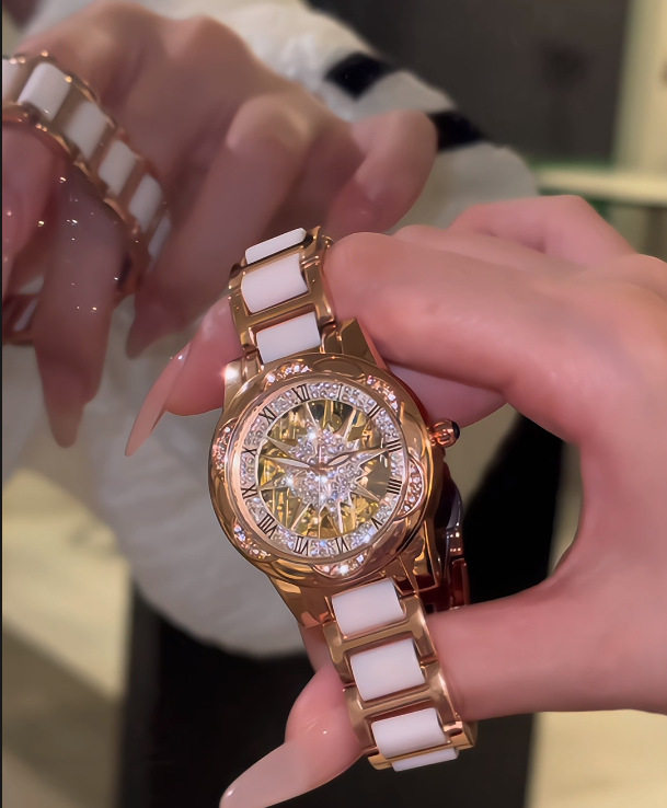 A generation of shaking audio and video number explosions sunflower hollow ladies watch ceramic white flywheel diamond watch women 3 undefined