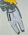 Suit. charcoal gray and cold gray