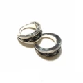Asymmetric cross flower ring