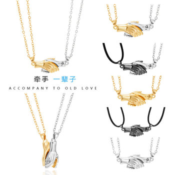 Cross-border hot selling couple holding hand necklace magnetic suction hand holding men and women niche design sense clavicle chain wholesale