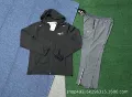 Black jacket + gray pants