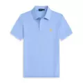 Light blue polo yellow label