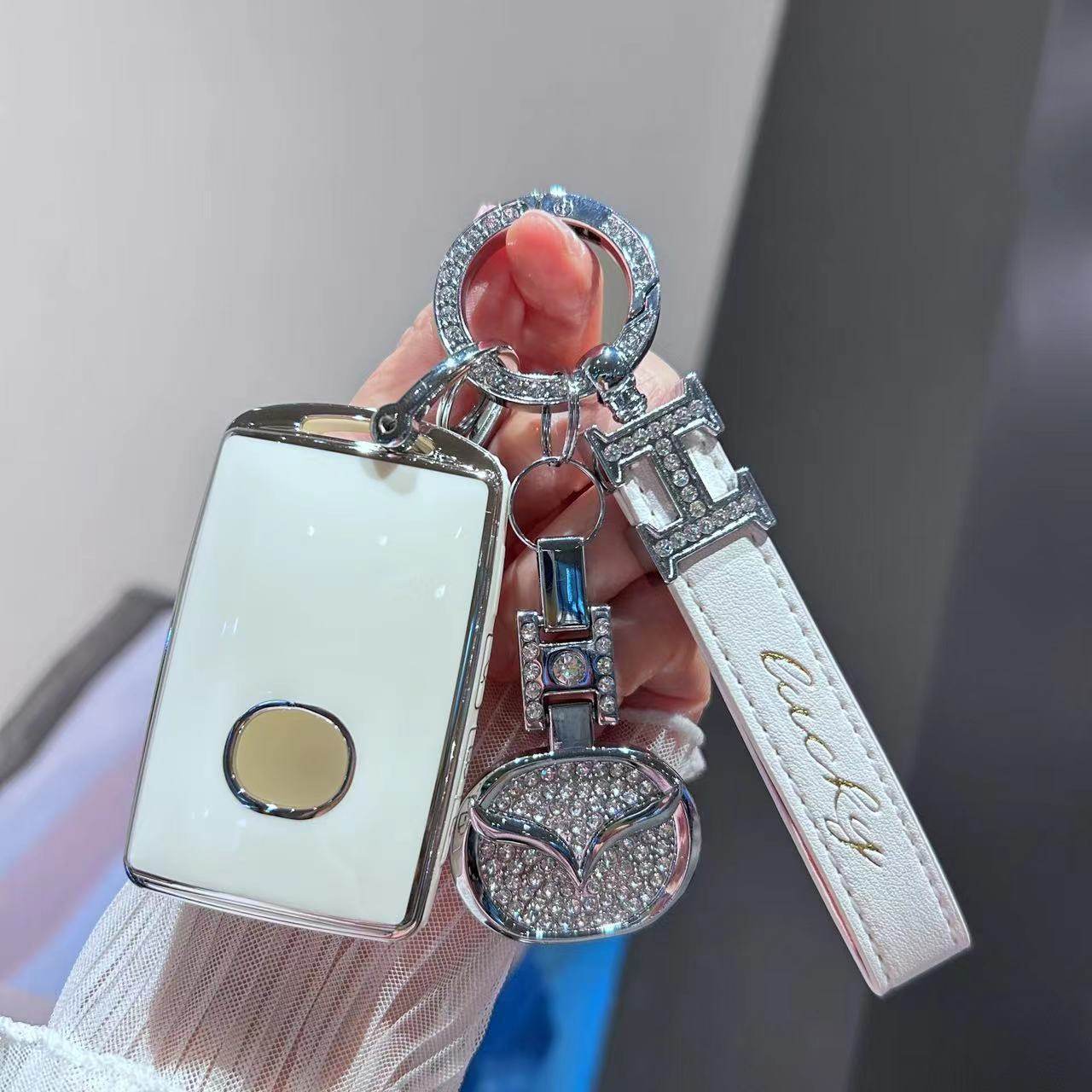 Suitable for Mazda 3 onksela key case next generation CX5 high-end CX30 car CX4 shell buckle bag for men and women