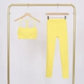 Bright yellow y-shaped vest and cropped pants suit