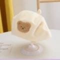 Beige—labeled bear