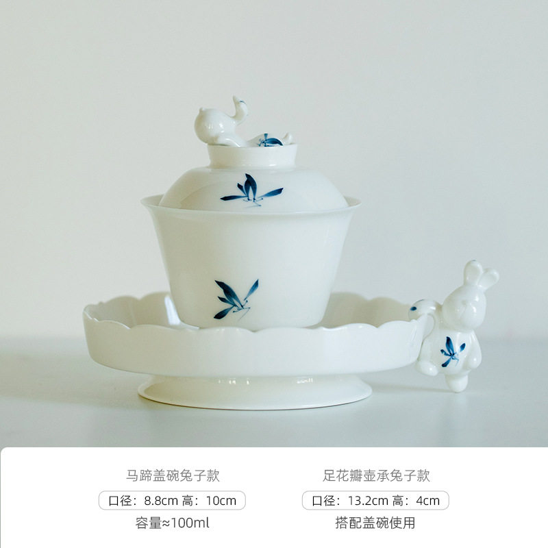 手描きの蘭の馬蹄は碗のウサギの金の壺を覆います。