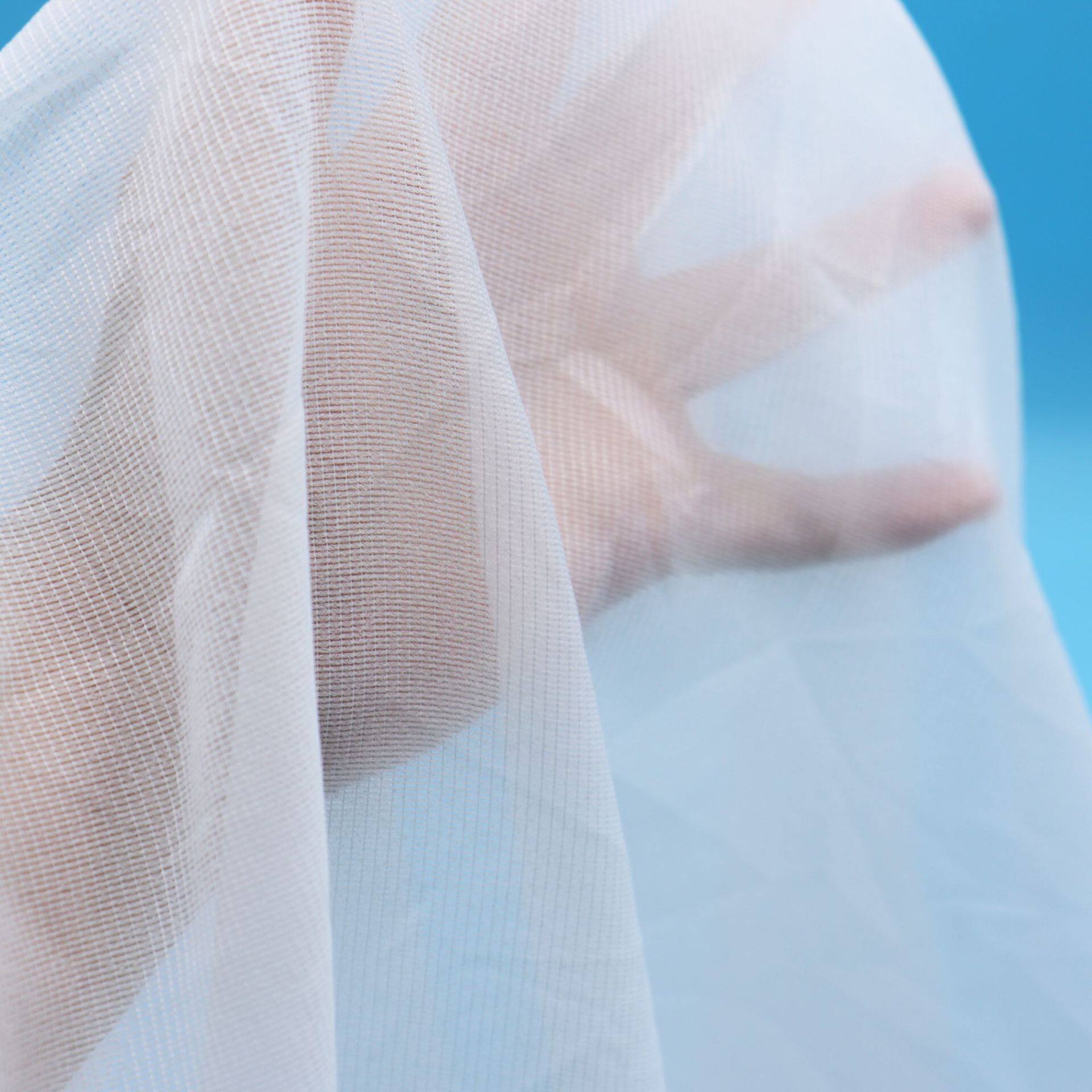 Wholesale In-Stock Full-Length Warp-Knitted Lining Fabric with a Draping, Stretchy, Lightweight Feel for Clothing and Dresses, Available in Black and White