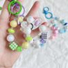 New houndstooth cube sugar beaded keychain pendant cute girl bag ornaments colorful wheel beads lobster buckle