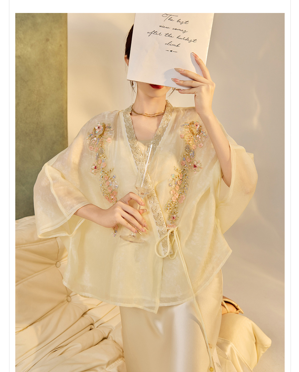 Áo khoác cardigan nữ dáng rộng thêu đính cườm chất liệu tencel phong cách nhẹ nhàng — mơ