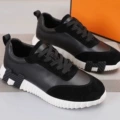 Black leather surface [black shoelaces]