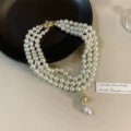 Gold three-layer pearl necklace