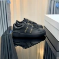 All black with gold studs