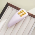 Patent leather-lotus pink spring clip [with label on the back]