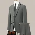 Light gray suit, trousers, tie