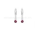 Three-diamond white gold earrings with red diamonds