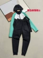 Black and white with mint green suit