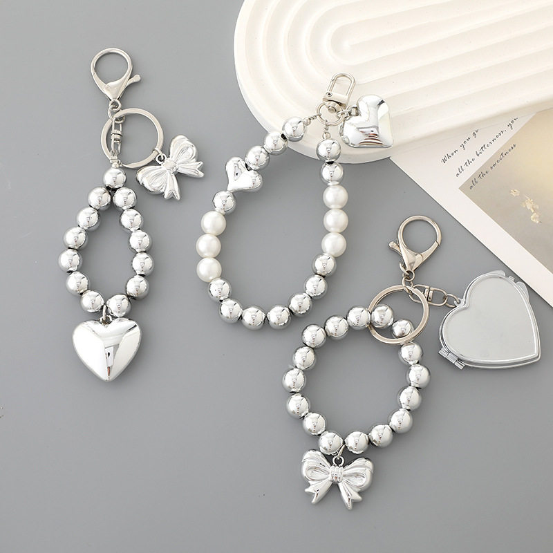 Creative New Silver-plated Love Bow Pendant Fashion All-match UV Bead Hanging Luggage Keychain Beaded Accessories
