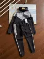 Gray and black suit
