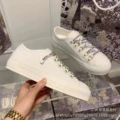 White eyelet button flat bottom