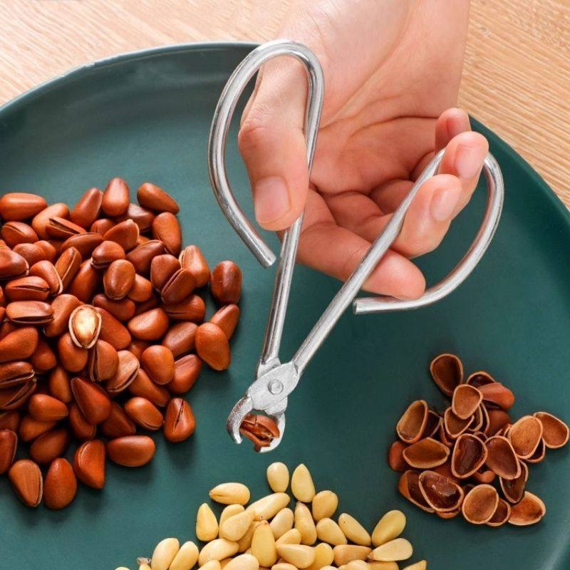 Pine nut shell remover melon seed shelling machine household nut special clip hazelnut melon seed pliers clip peeling melon seed artifact