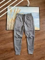 Dark gray trousers