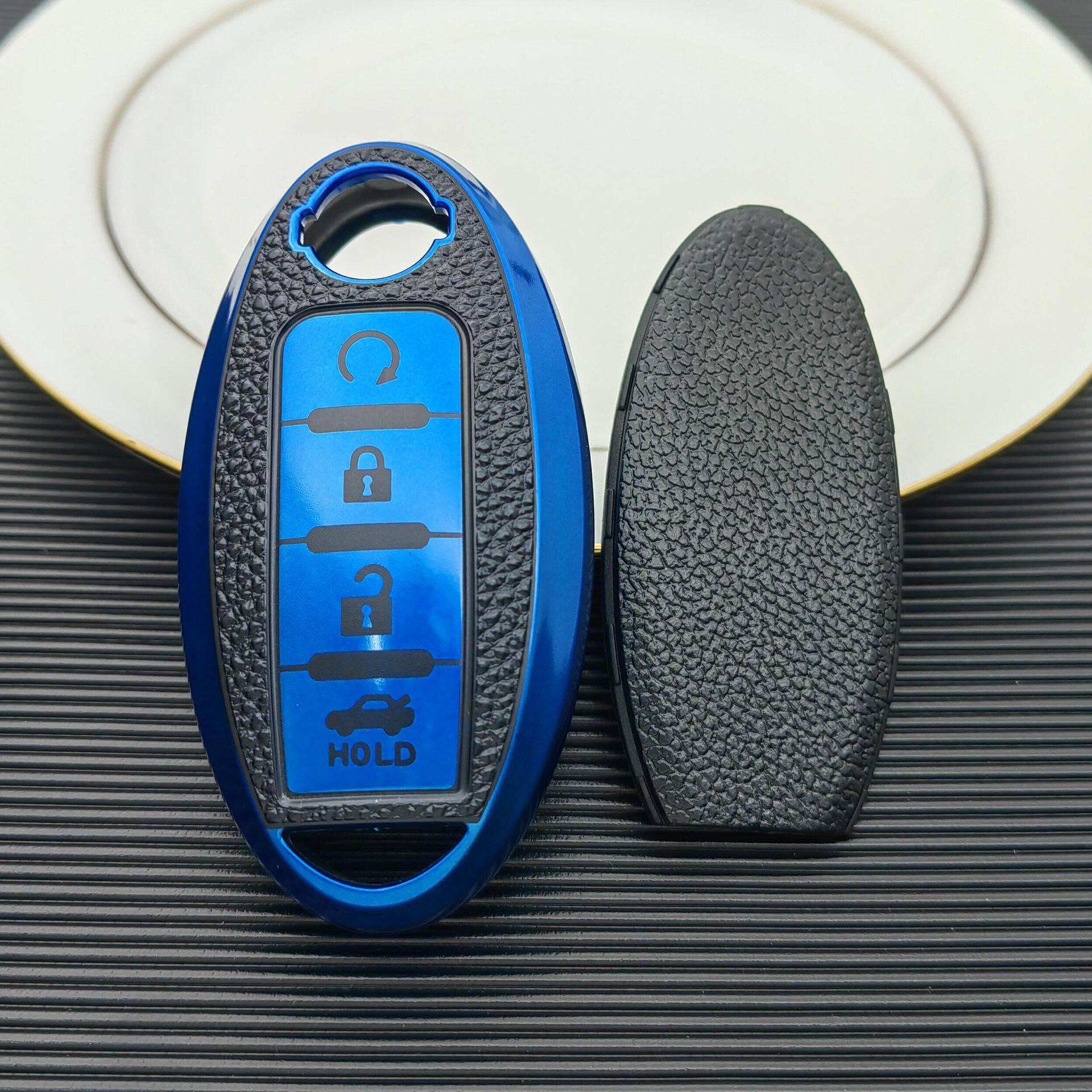 Suitable for Nissan key case new Teana Xuanyi Qida Qijun Blue Bird Tule qashke Nissan key case shell buckle