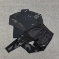Pattern spliced ​​semi-lengthened sleeves black + high-end spliced ​​pattern trousers black