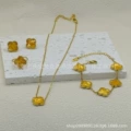 Bright yellow double-sided mother-of-pearl four-piece set