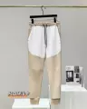 Khaki and white sweatpants
