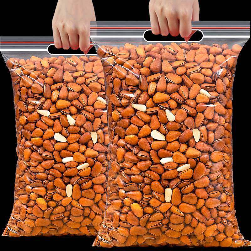 New northeast pine nuts 500g non-special extra large particles hand-peeled open red pine nuts original bulk dried nuts