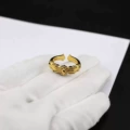 Gold cross flower ring