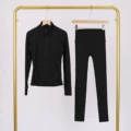 Black polka dot jacket and cropped pants suit