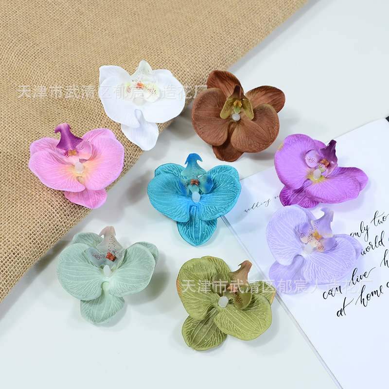 显纹蝴蝶兰花朵家居装饰仿真花批发茶几电视柜摆放绢花婚礼插花朵